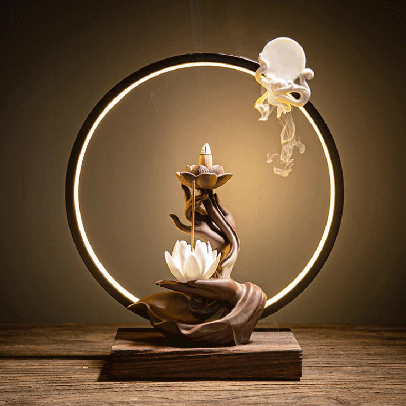 Exquisite Buddha’s Hand Holding Lotus LED Backflow Incense Burner – Pure handmade masterpiece in classic Chinese style. As the backflow cone burns, fragrant smoke gently cascades from the sacred lotus into the serene palm