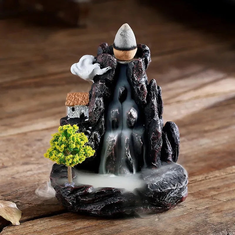 Dreamy High Peak Waterfall Incense Burner – Hand-finished resin sculpture designed for backflow cones. Watch in awe as scented smoke flows downward like morning mist over towering mountains—pure tranquility and visual poetry