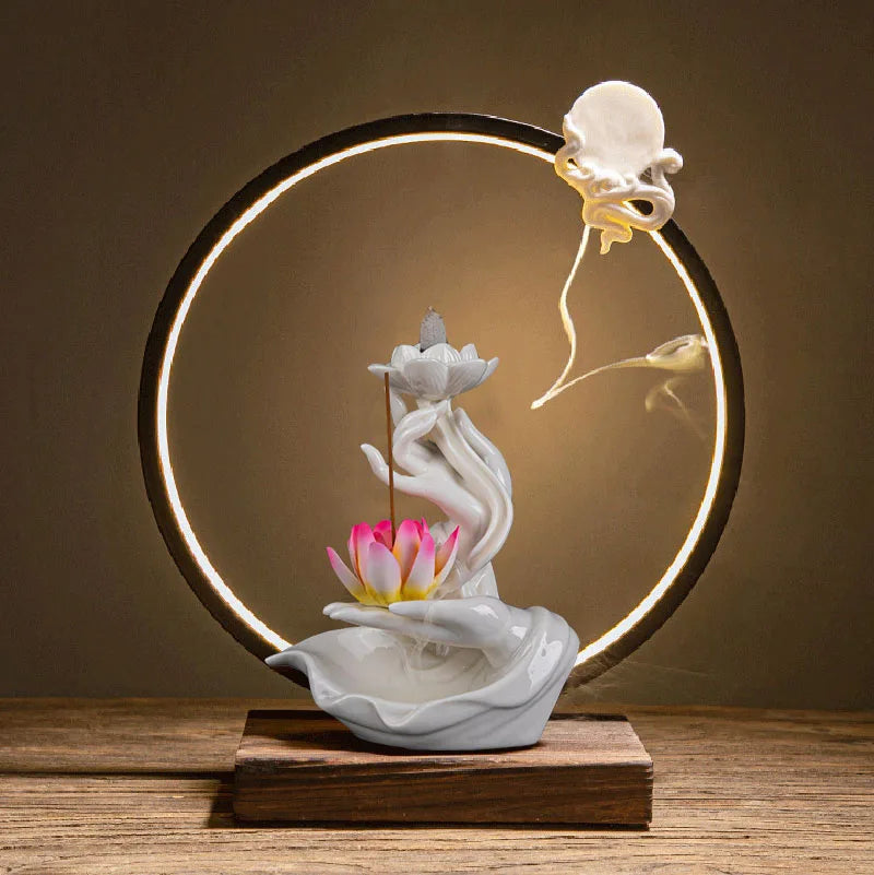 Exquisite Buddha’s Hand Holding Lotus LED Backflow Incense Burner – Pure handmade masterpiece in classic Chinese style. As the backflow cone burns, fragrant smoke gently cascades from the sacred lotus into the serene palm