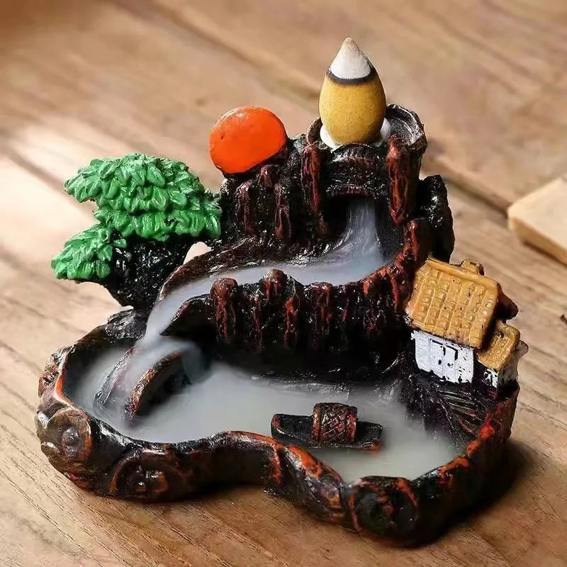 Dreamy High Peak Waterfall Incense Burner – Hand-finished resin sculpture designed for backflow cones. Watch in awe as scented smoke flows downward like morning mist over towering mountains—pure tranquility and visual poetry